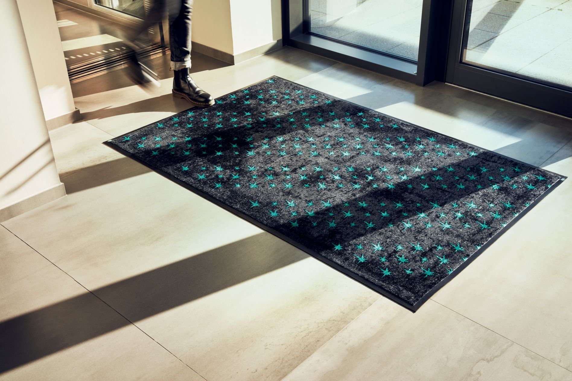 An Ille carpet in front of a door