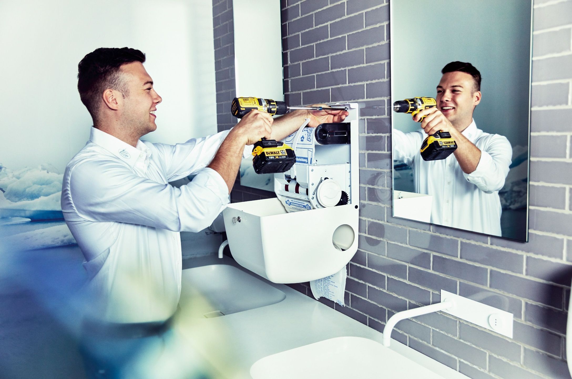 Person installing a dispenser